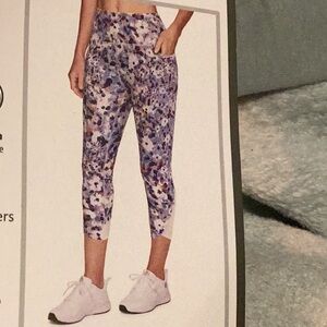 RBX Squat Proof Capri Legging w/ Floating Pockets, Tulip Hem w/ Mesh Details